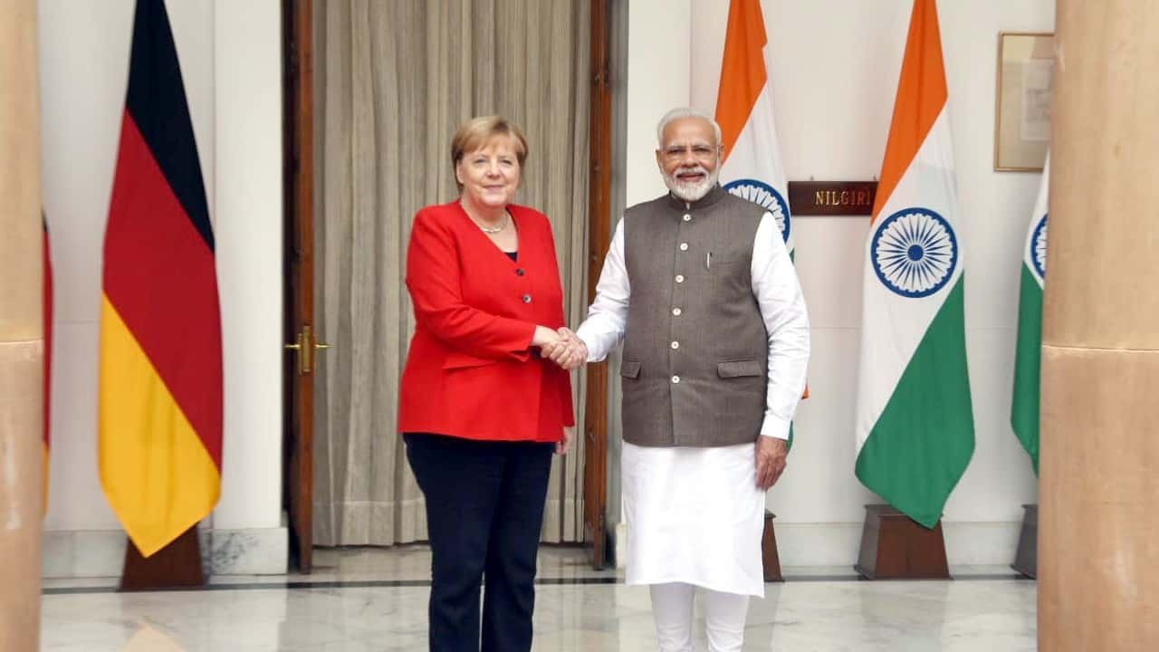 Merkel To Sit Through National Anthem