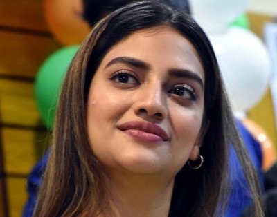 Nusrat Pays Surprise Visit To Kolkata Market Hands Out Masks