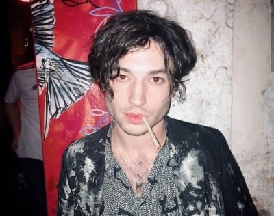 Ezra Miller Appears To Throttle Shove Female Fan In Video