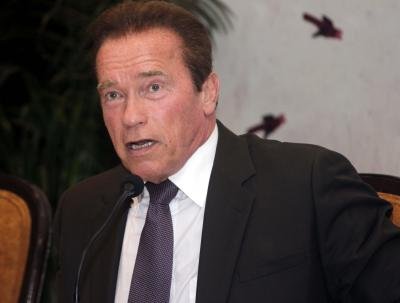 Arnold Schwarzenegger Works Out With Pet Donkey