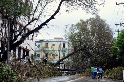 Cuban Firefighters Battle Blazes After Storm Lashes Island