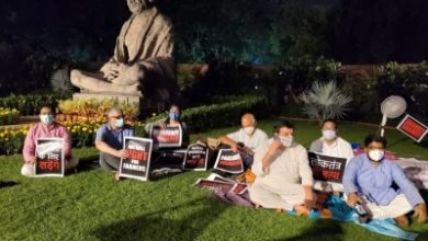 Singing Sitting On Grass 8 Suspended Mps Continue Dharna