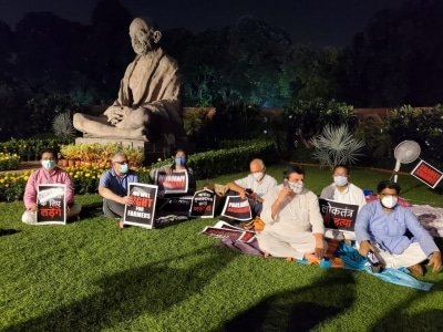 Singing Sitting On Grass 8 Suspended Mps Continue Dharna