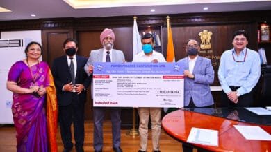 P F C Pays Interim Dividend To Government Of India